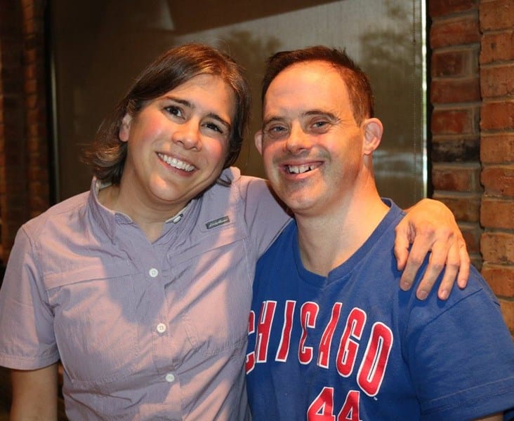 a man with down syndrome and a woman